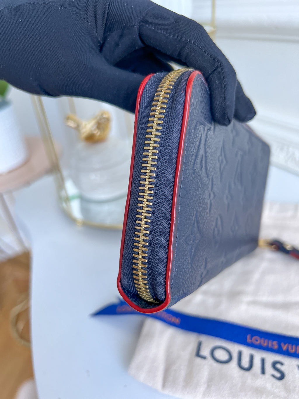 LV wallet empreinte dark blue with red