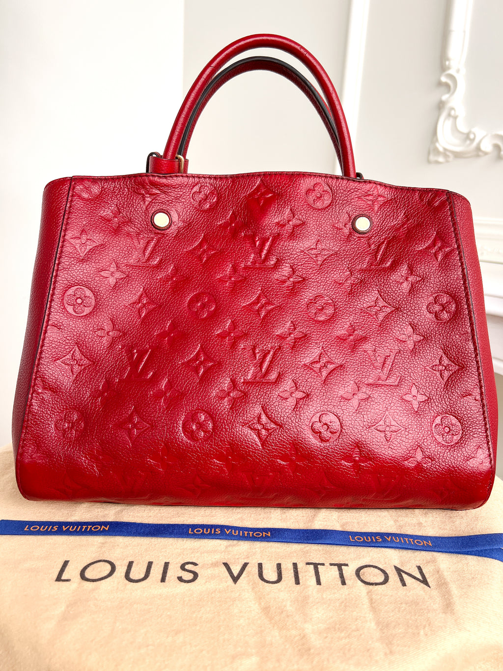 Authentic LV Montaigne MM Empreinte Monogram Red