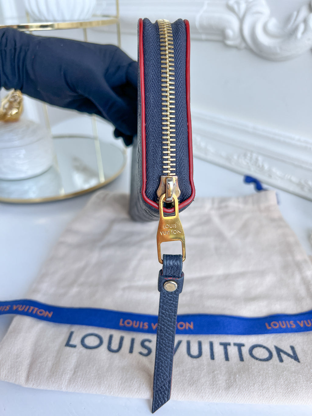 LV wallet empreinte dark blue with red