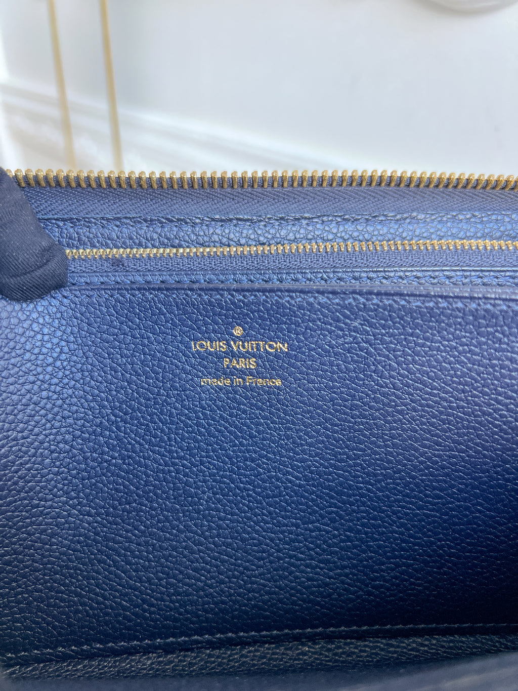 LV wallet empreinte dark blue with red