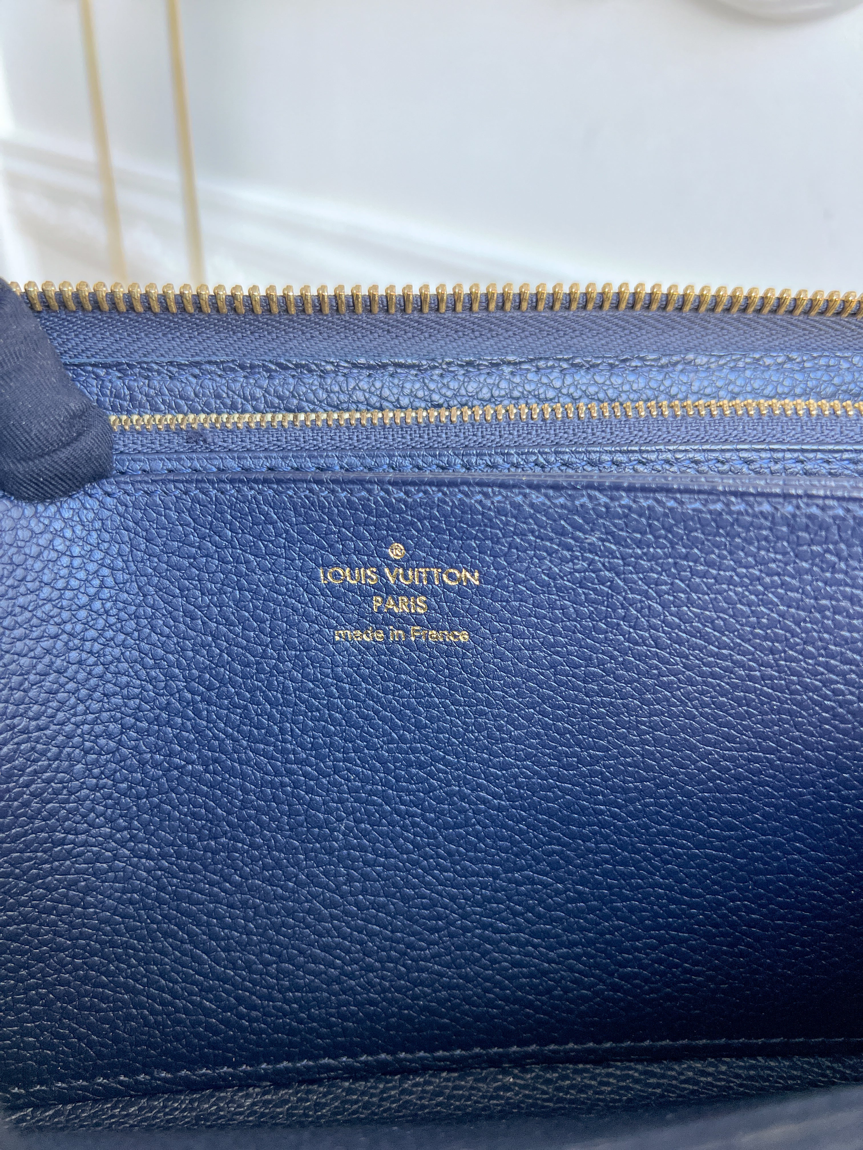 LV wallet empreinte dark blue with red