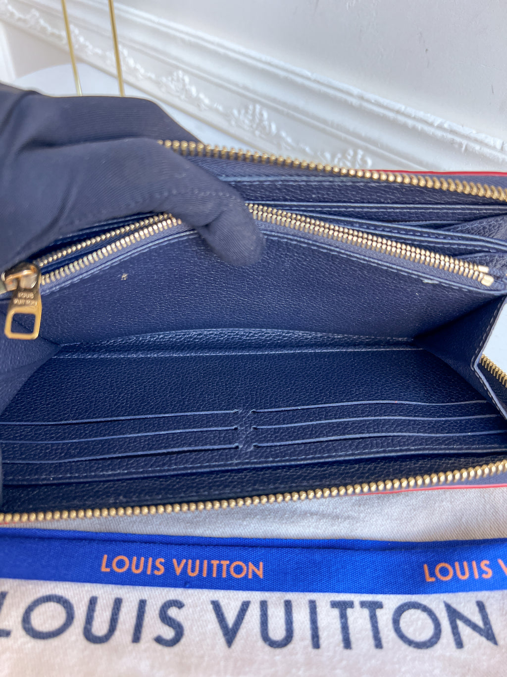 LV wallet empreinte dark blue with red