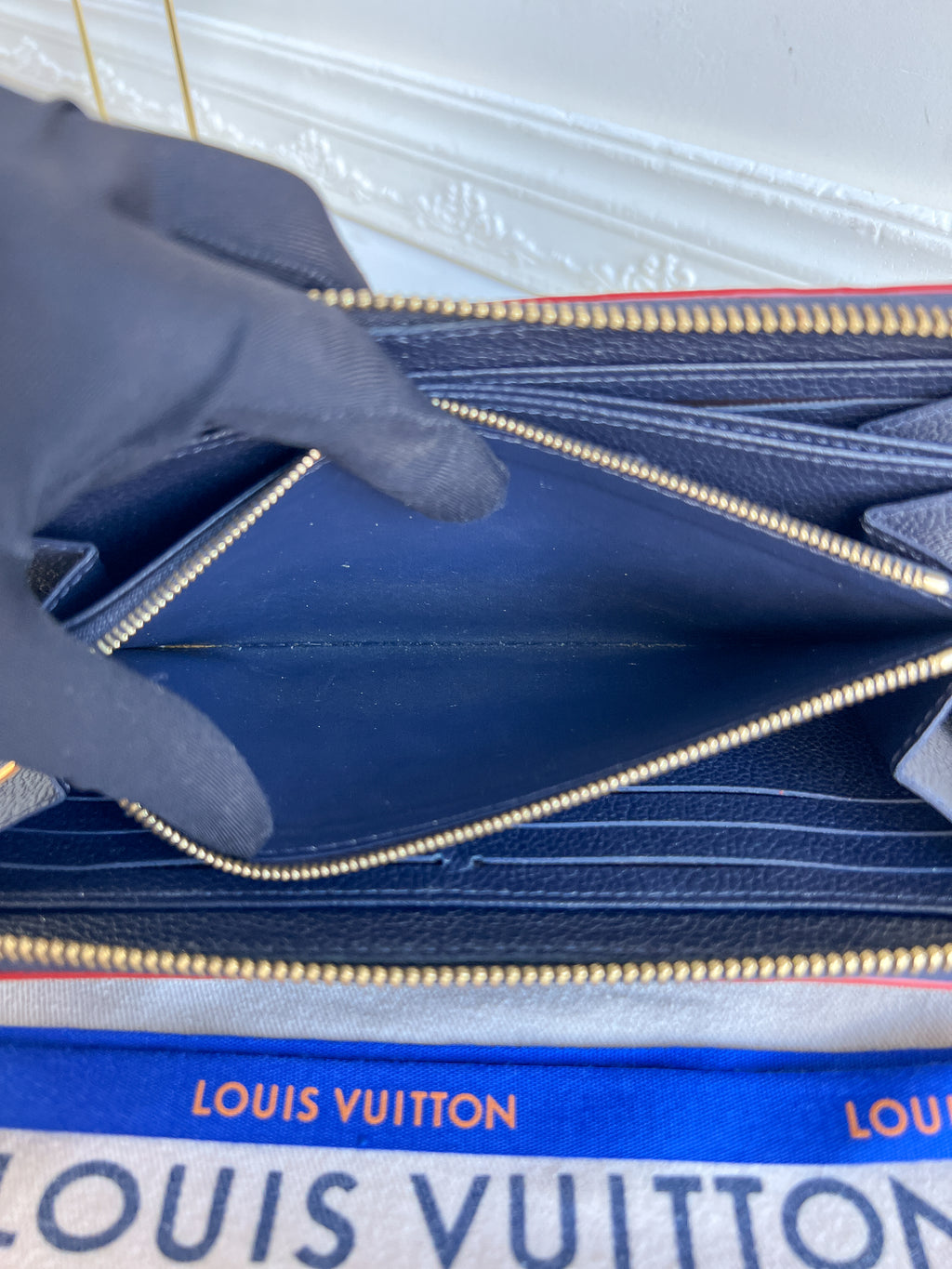 LV wallet empreinte dark blue with red
