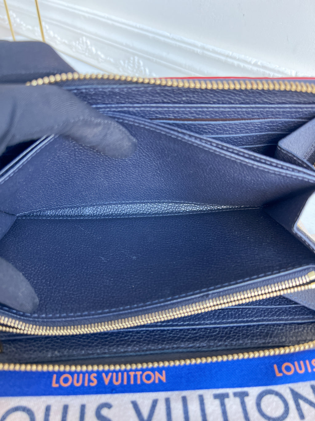 LV wallet empreinte dark blue with red