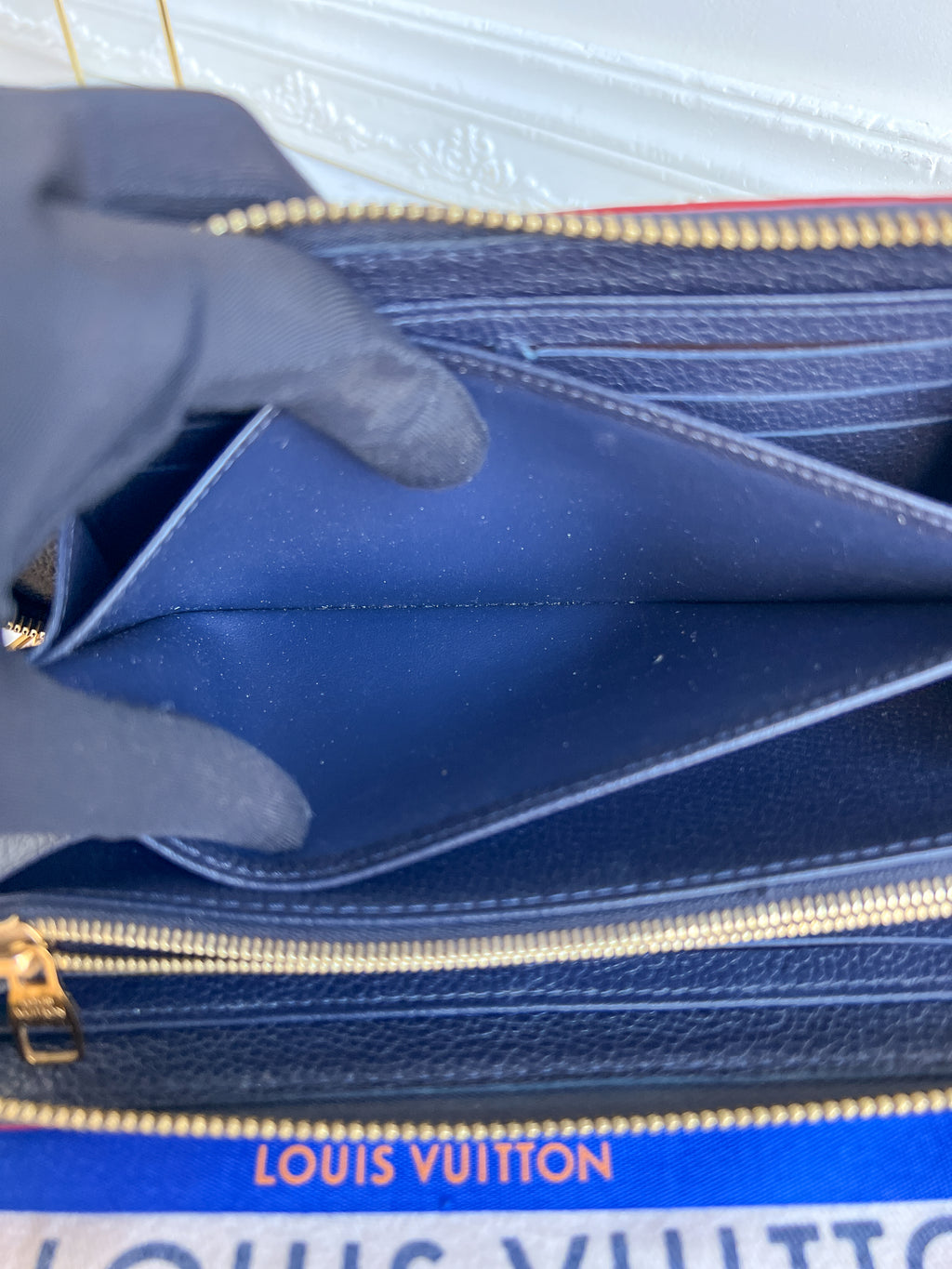 LV wallet empreinte dark blue with red