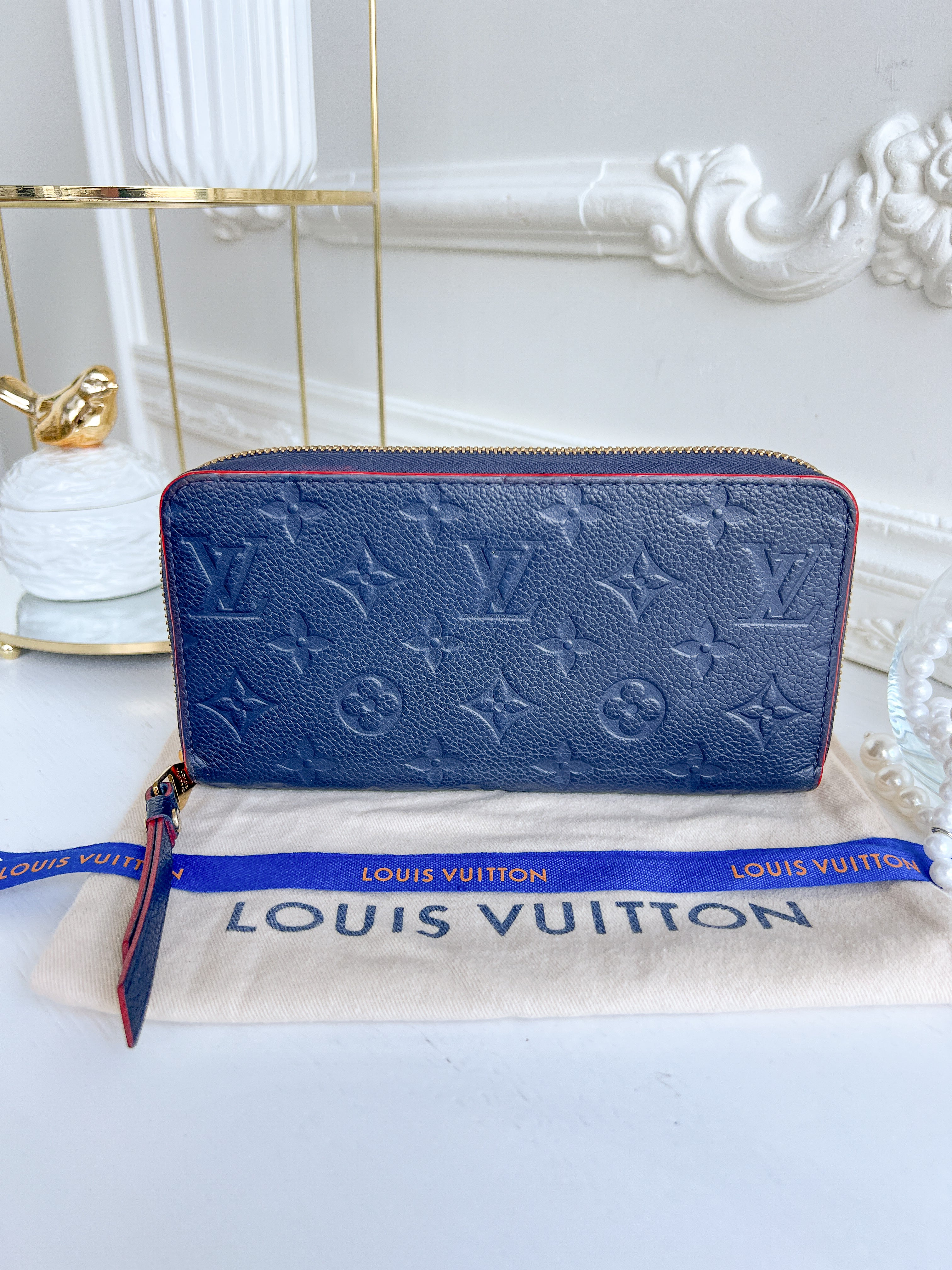 LV wallet empreinte dark blue with red