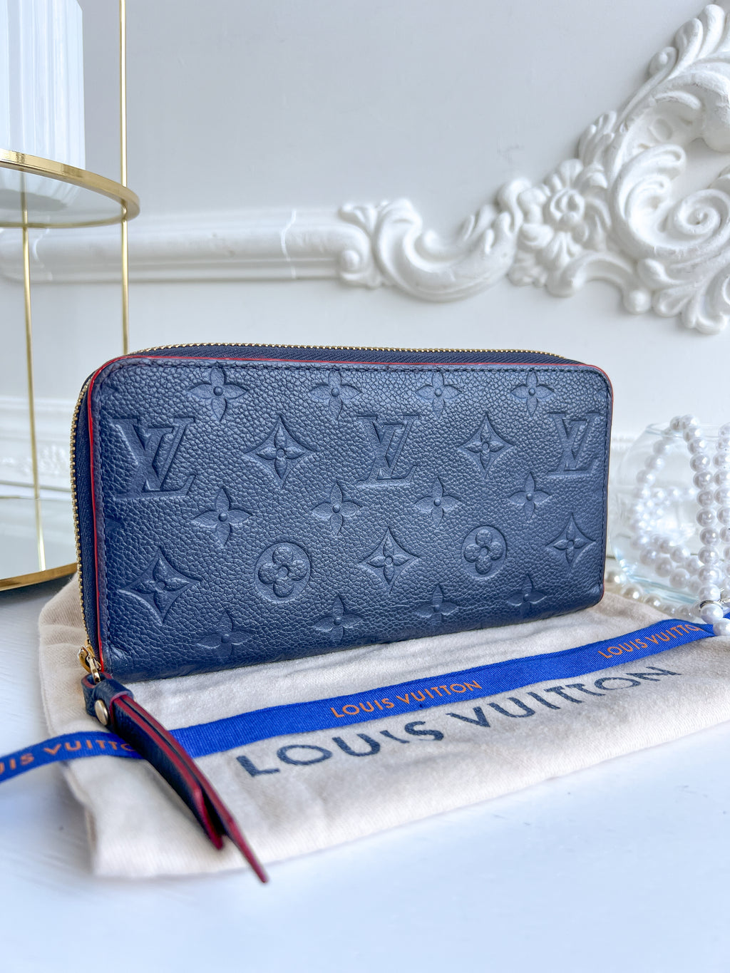 LV wallet empreinte dark blue with red