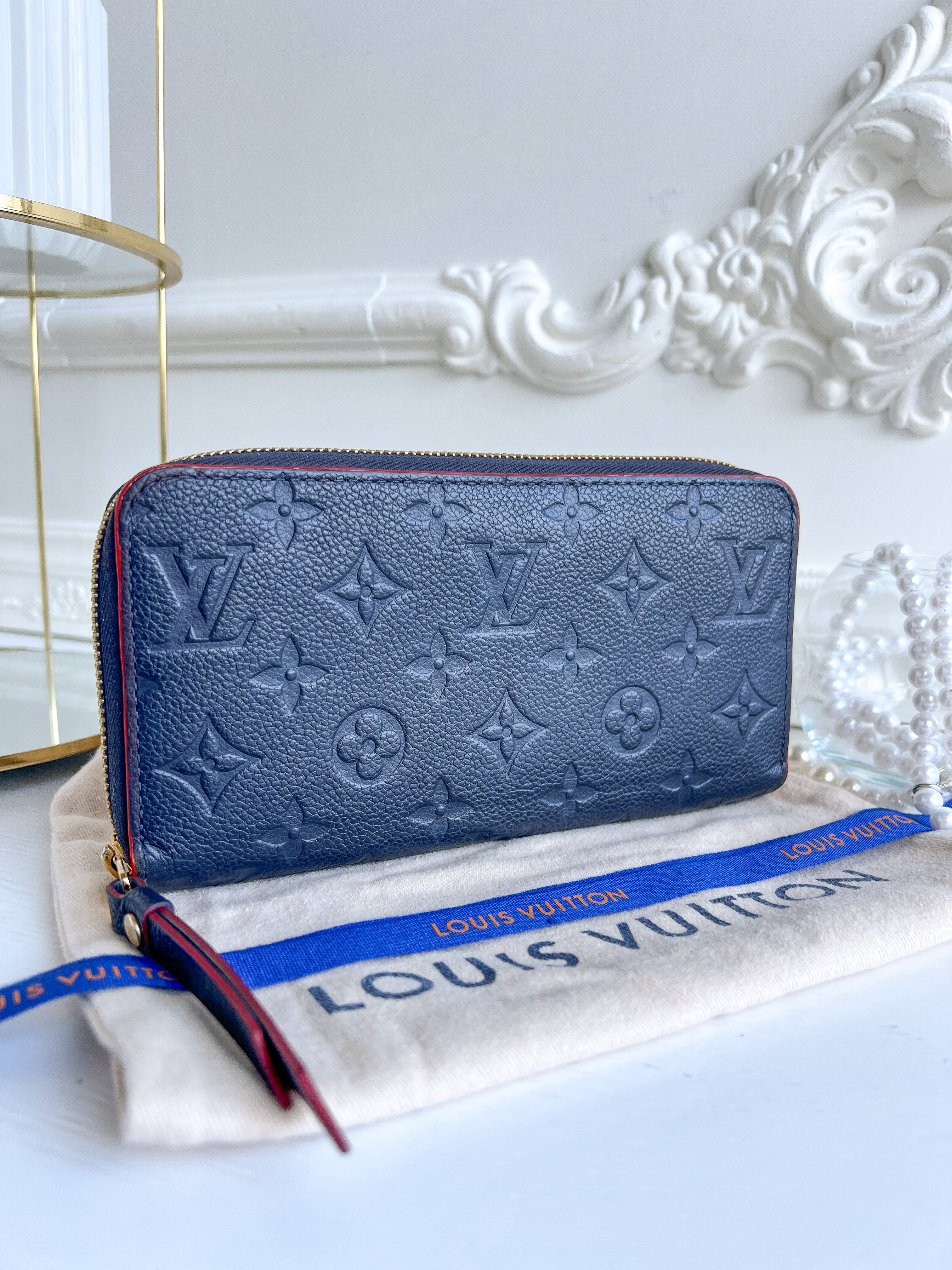 LV wallet empreinte dark blue with red