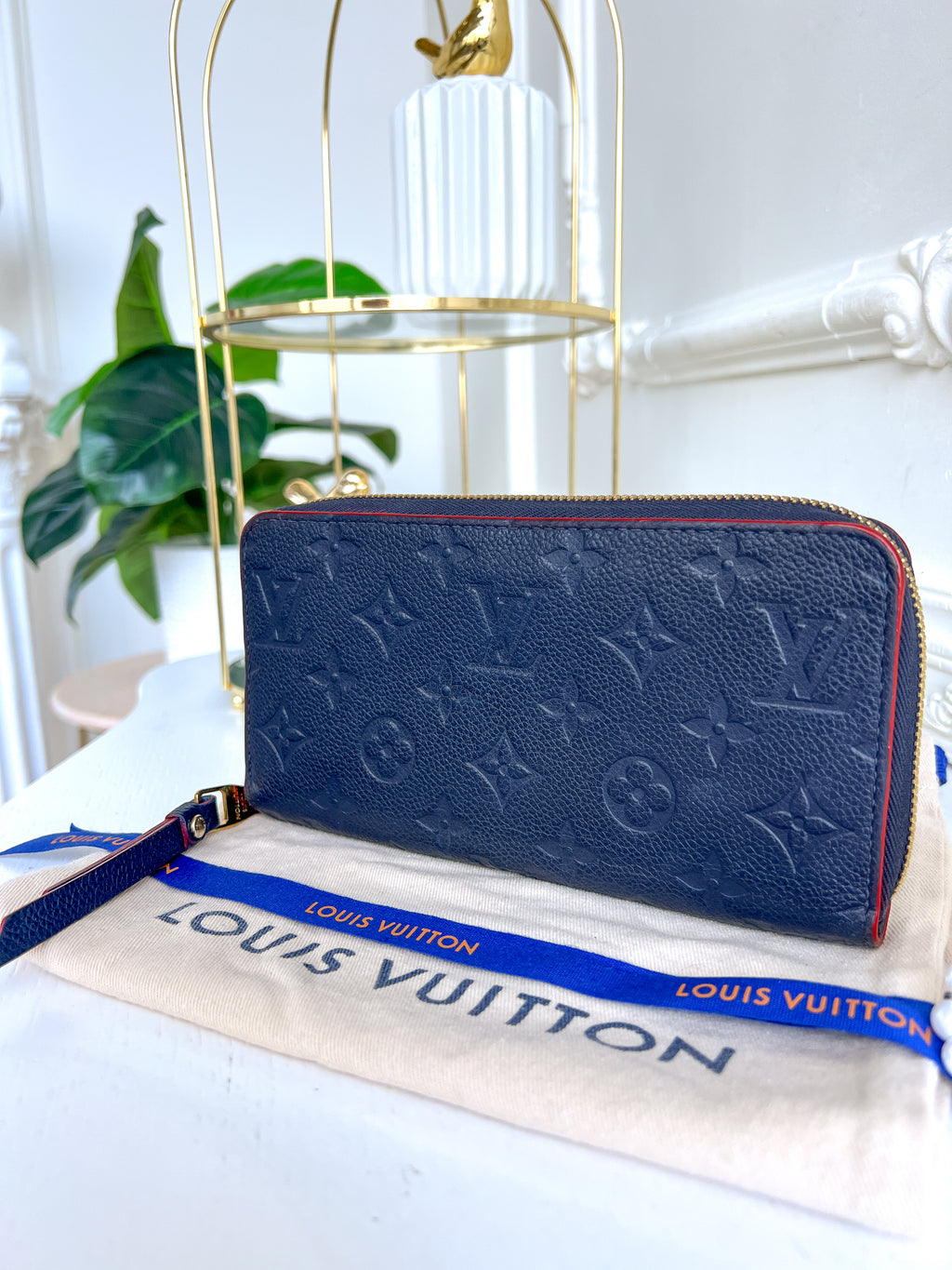 LV wallet empreinte dark blue with red