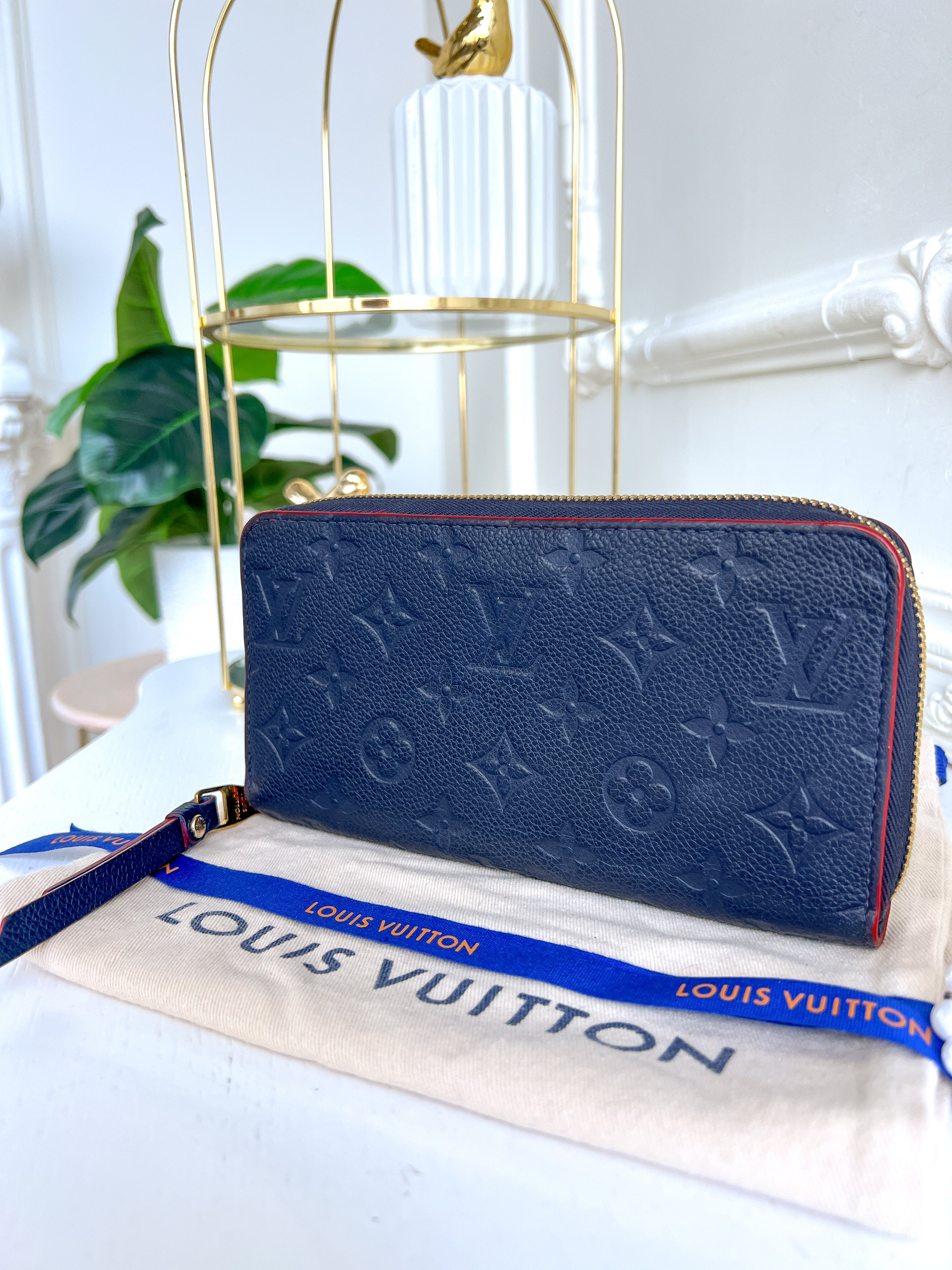 LV wallet empreinte dark blue with red