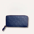 LV wallet empreinte dark blue with red