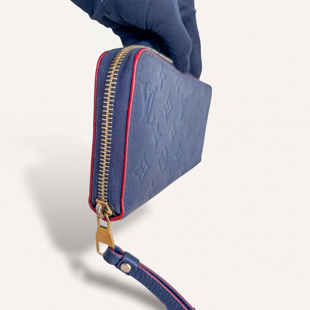 LV wallet empreinte dark blue with red