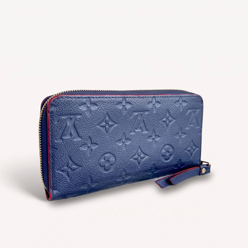 LV wallet empreinte dark blue with red