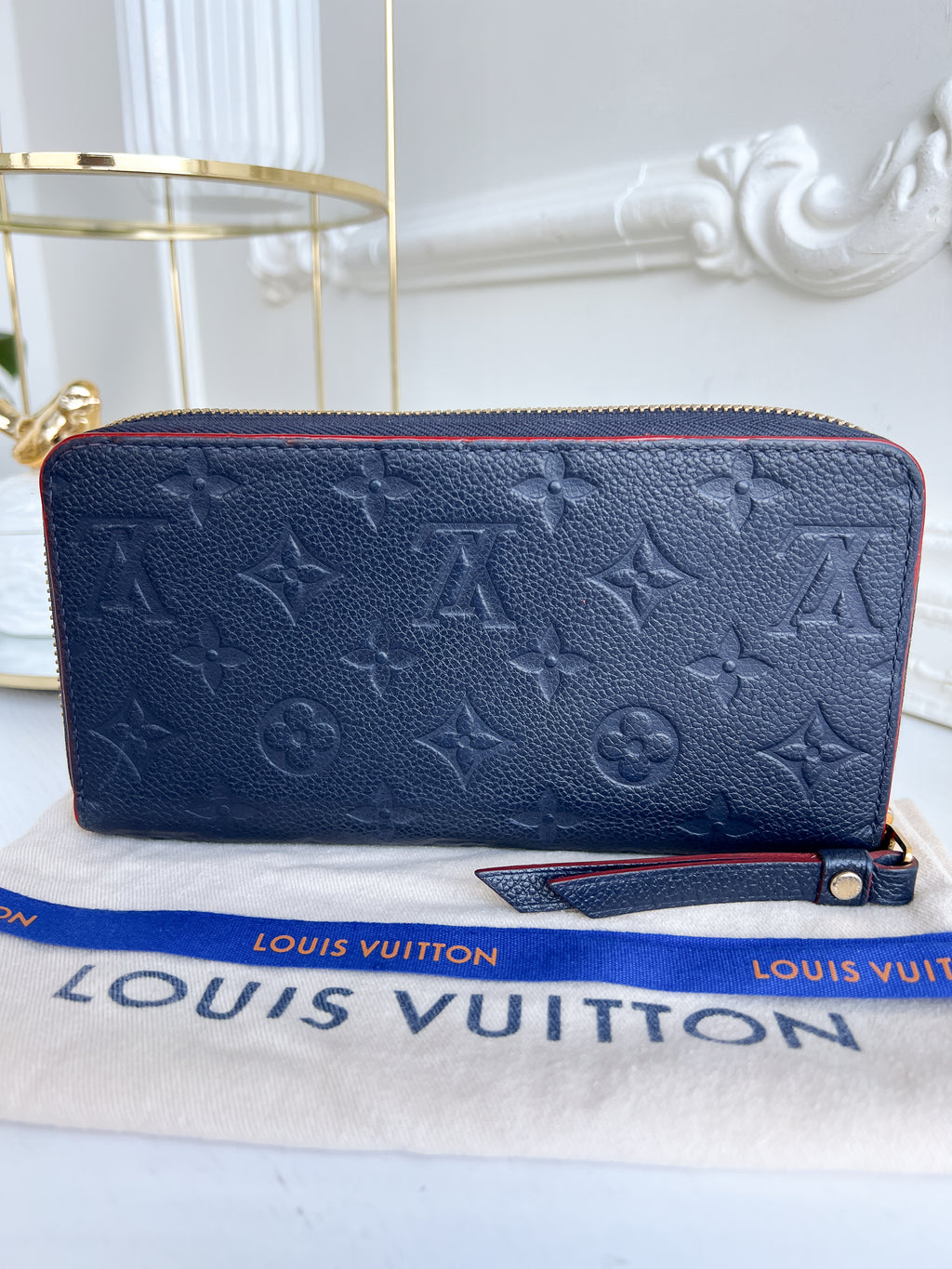 LV wallet empreinte dark blue with red