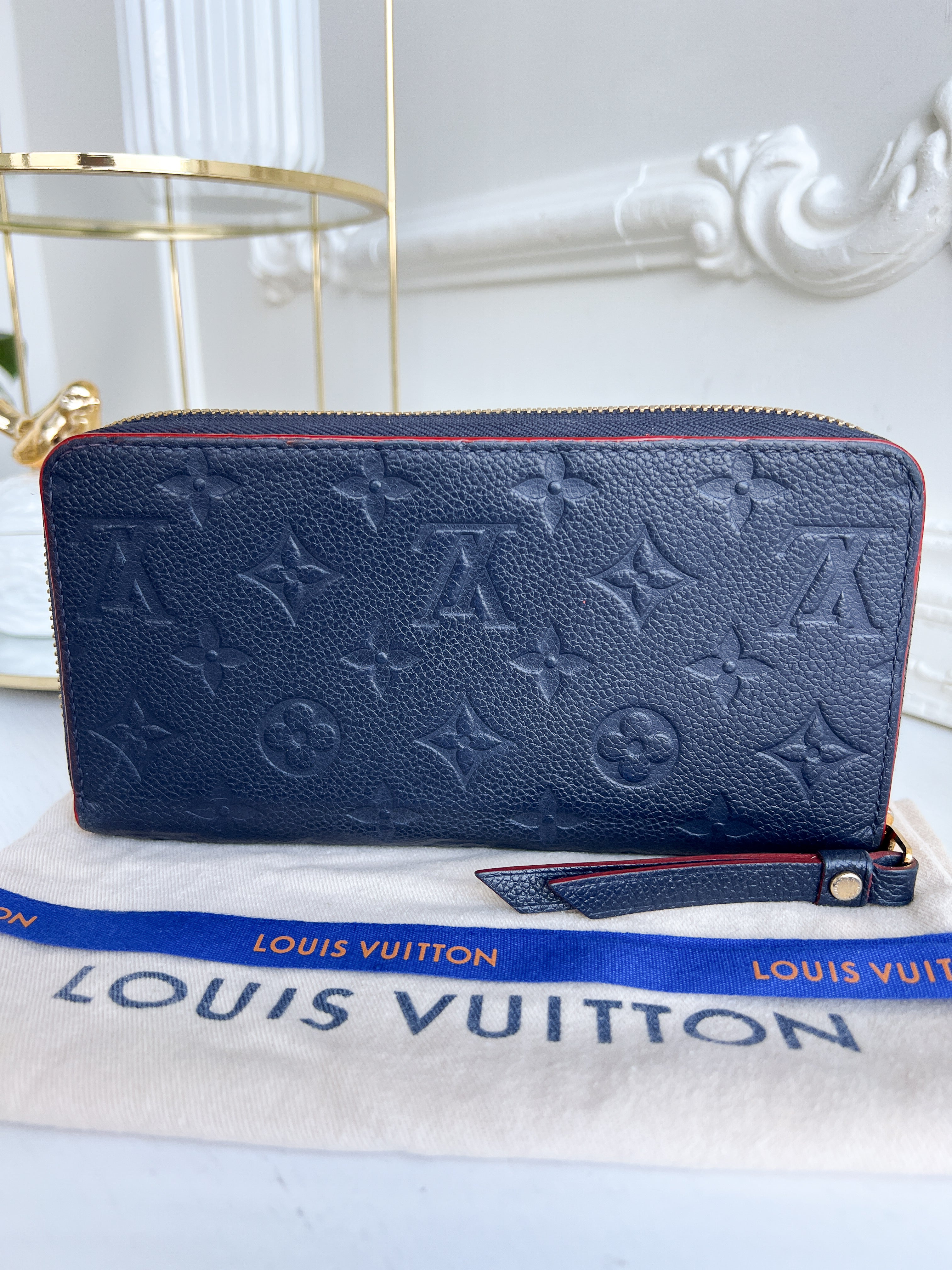 LV wallet empreinte dark blue with red