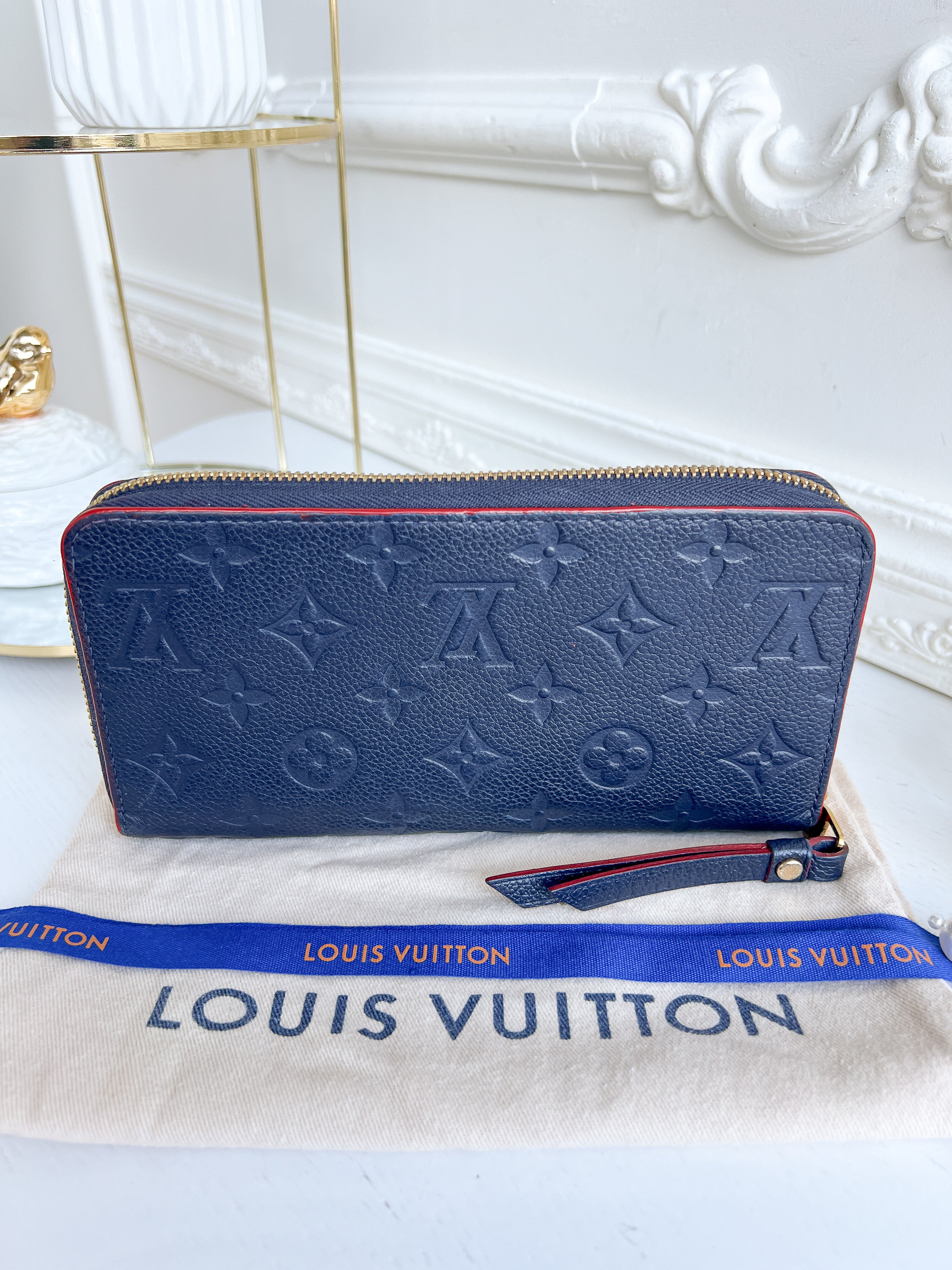 LV wallet empreinte dark blue with red