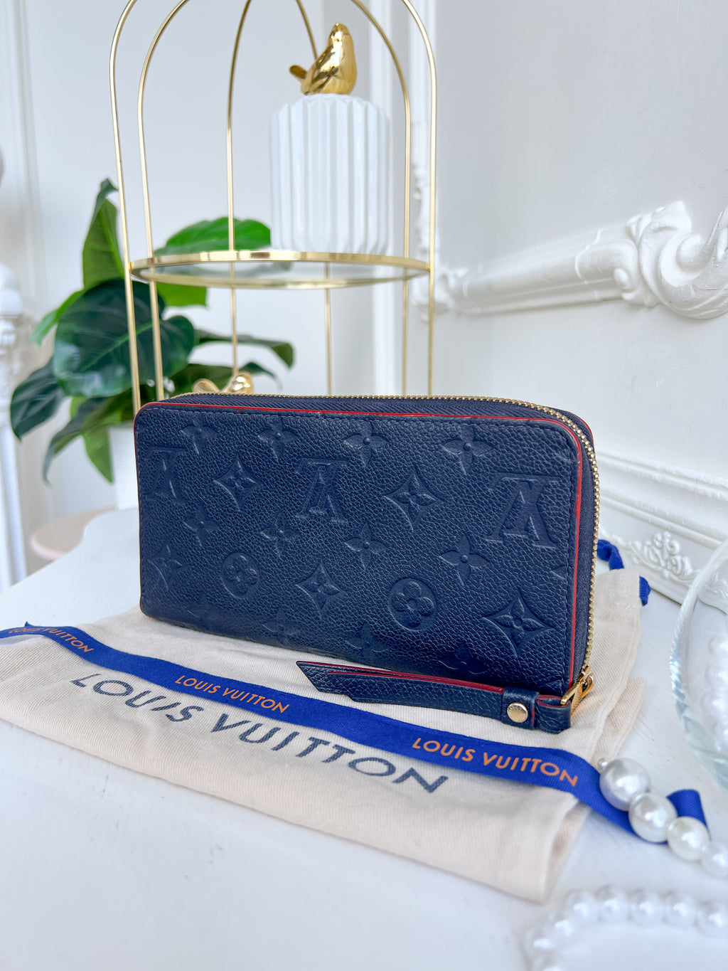 LV wallet empreinte dark blue with red
