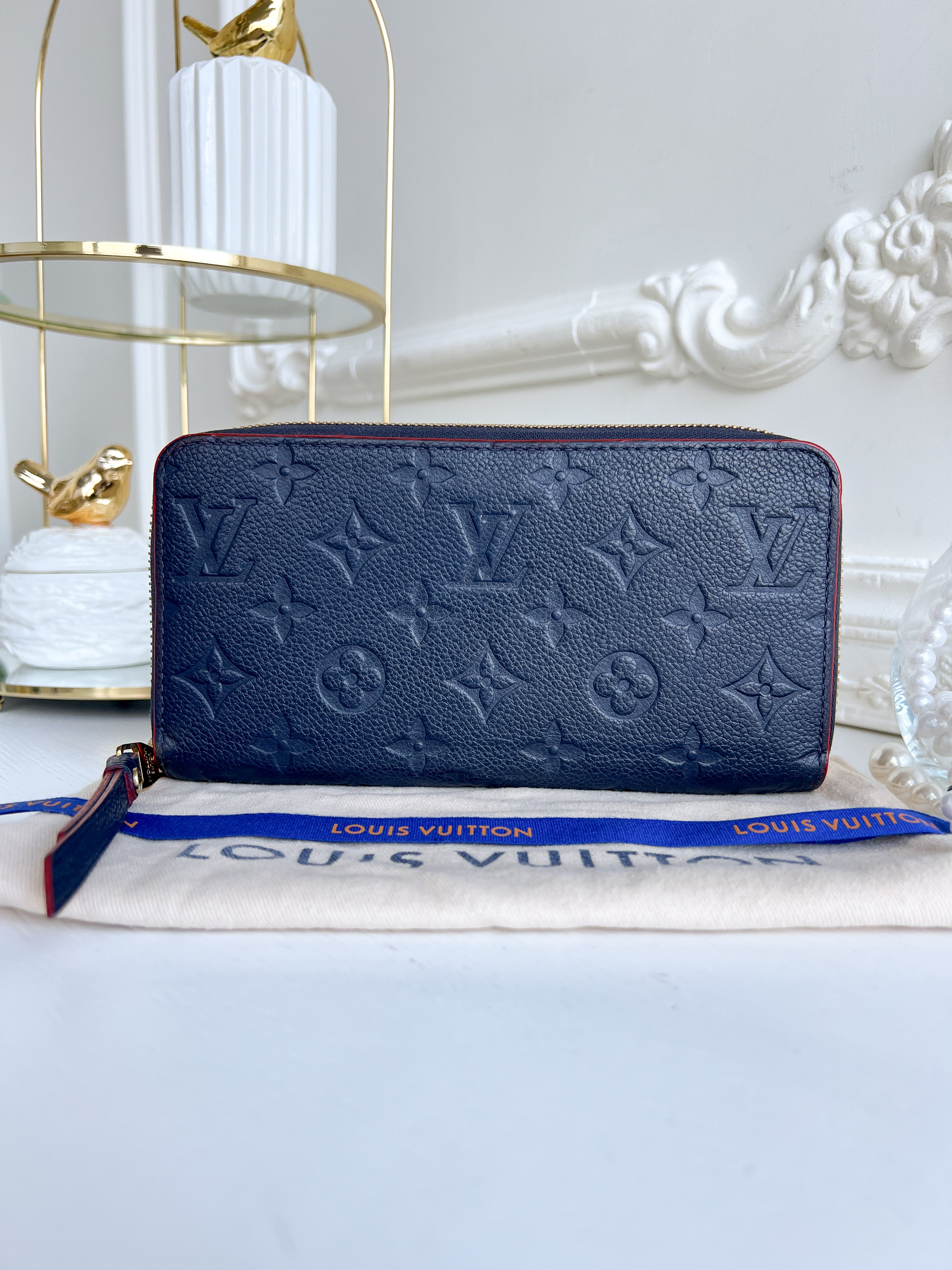LV wallet empreinte dark blue with red